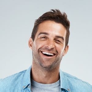 Skilled drywall installers working on interior wall installation.